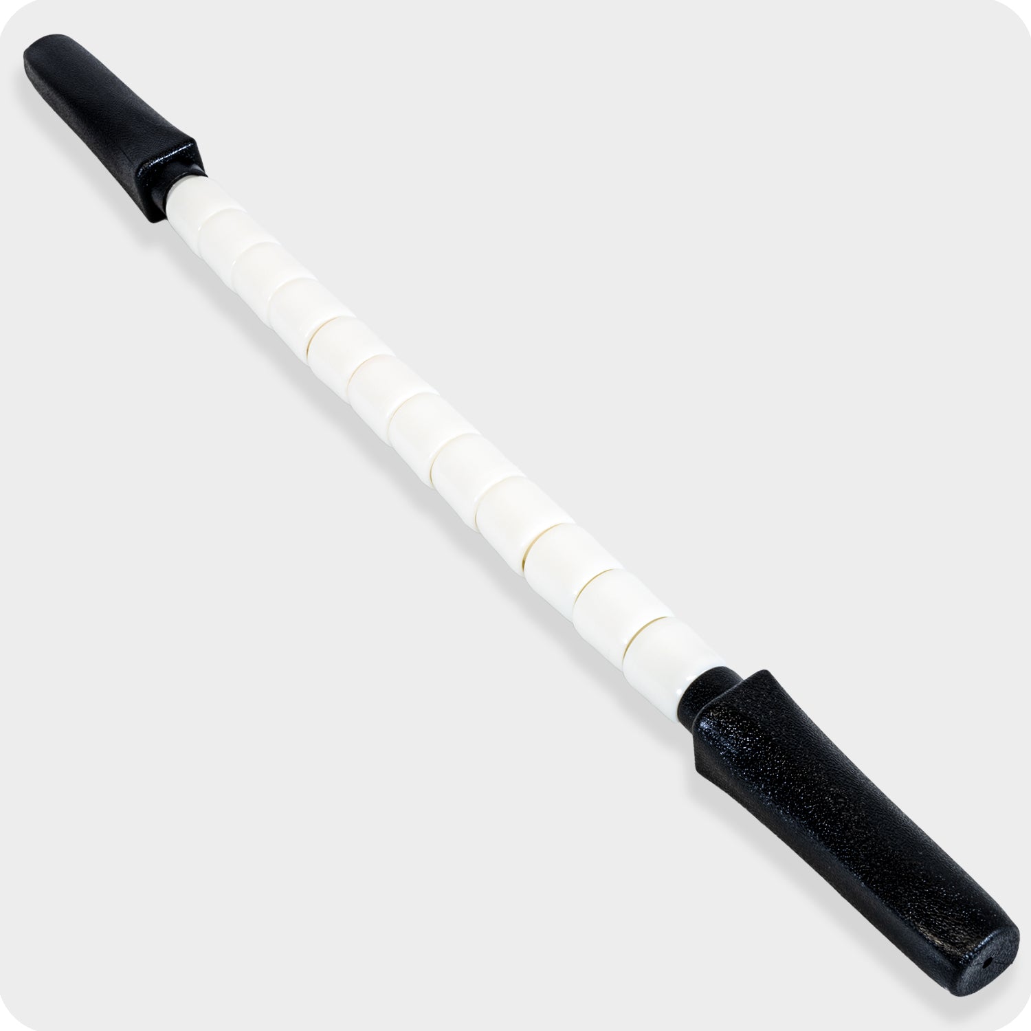 The Stiff Stick - 24 is a professional-grade muscle roller stick with segmented rollers and black handles on both ends for deep tissue massage, shown on a light gray background.