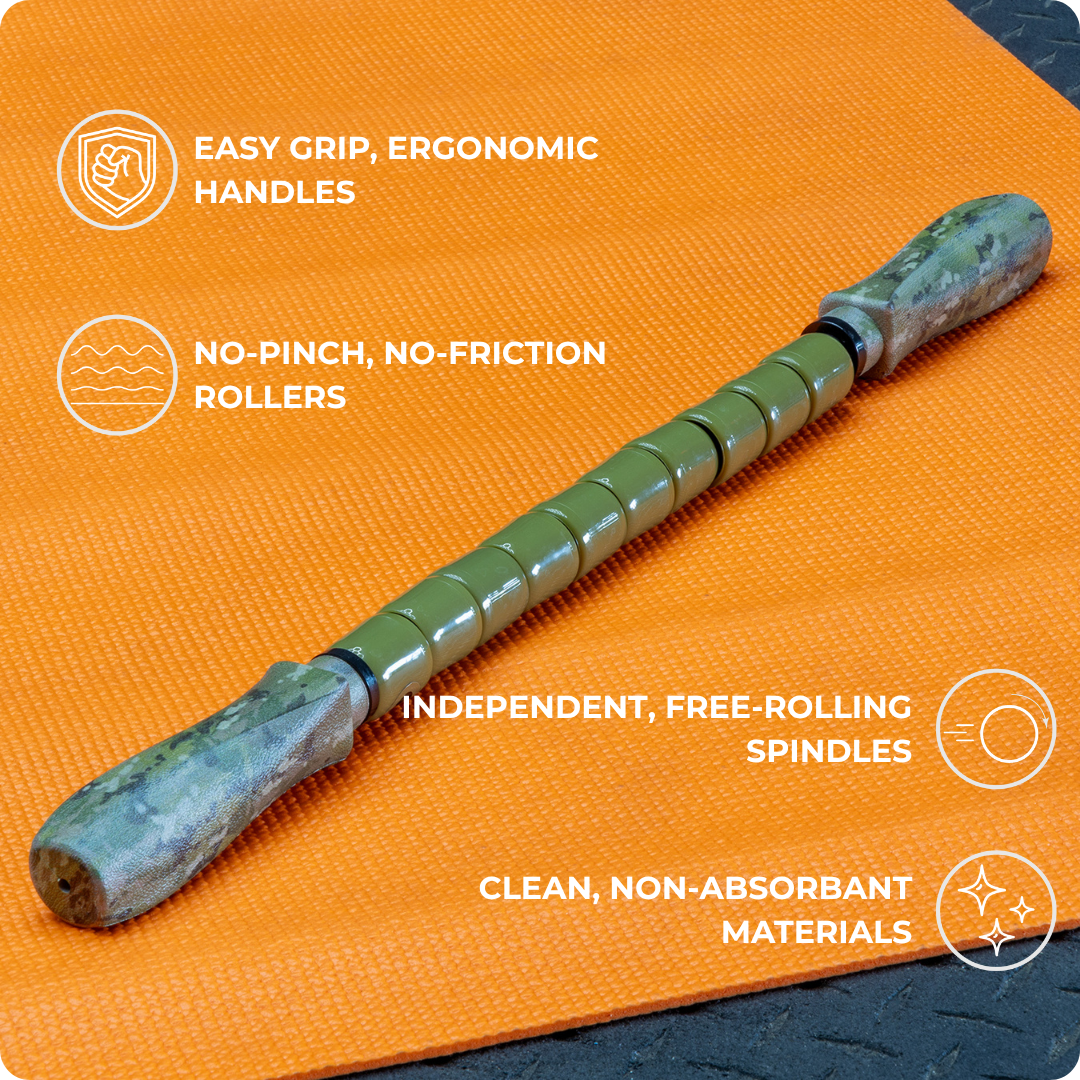 The Hunter Stick-22, featuring green ergonomic handles and free-rolling spindles, rests on an orange mat. Highlights include grip handles, no-pinch rollers, non-absorbent build, and easy rolling—ideal as an outdoor recovery stick.